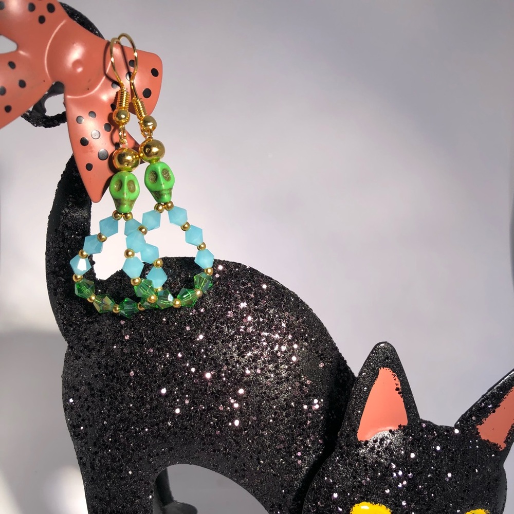 Star Crafts Green Skull Earrings